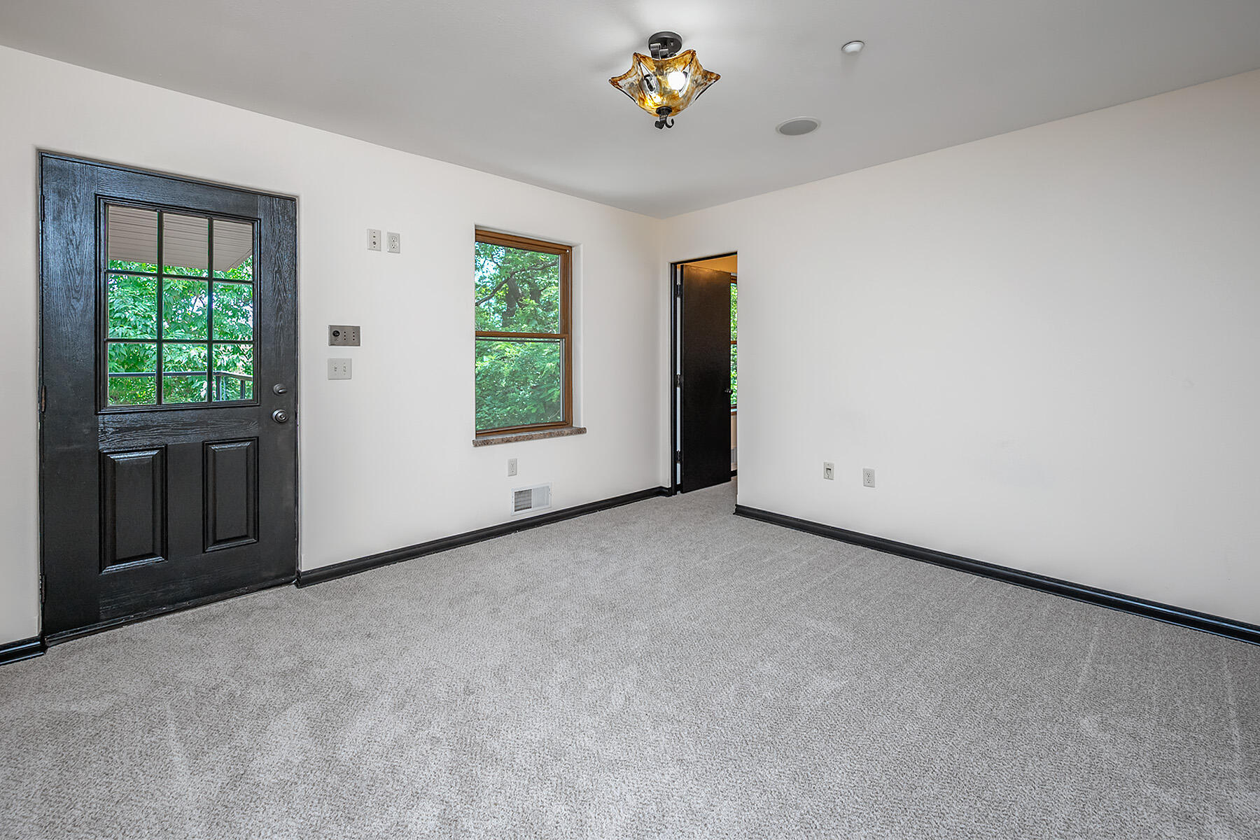 W303S10481 Sandy Beach Road Mukwonago, WI 53149 - Photo 17 of 74 Owners Suite with walk out to Deck First Floor