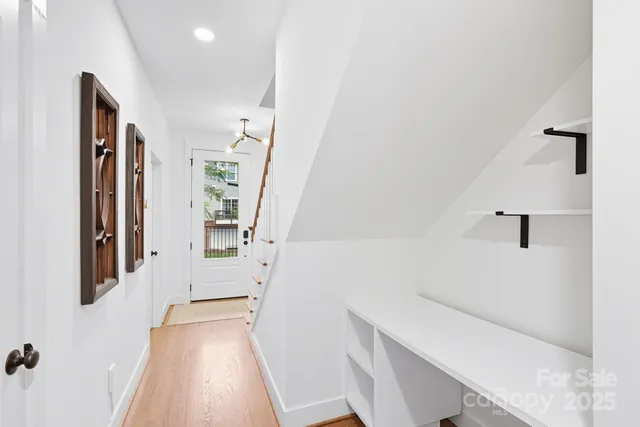 a view of hallway with stairs