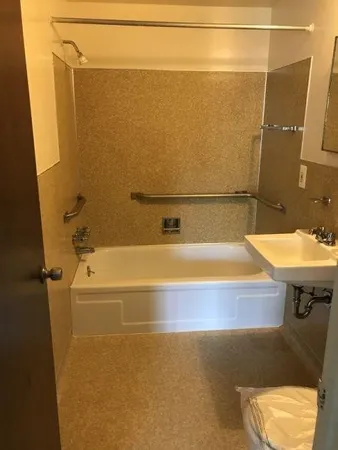 a bathroom with a bathtub