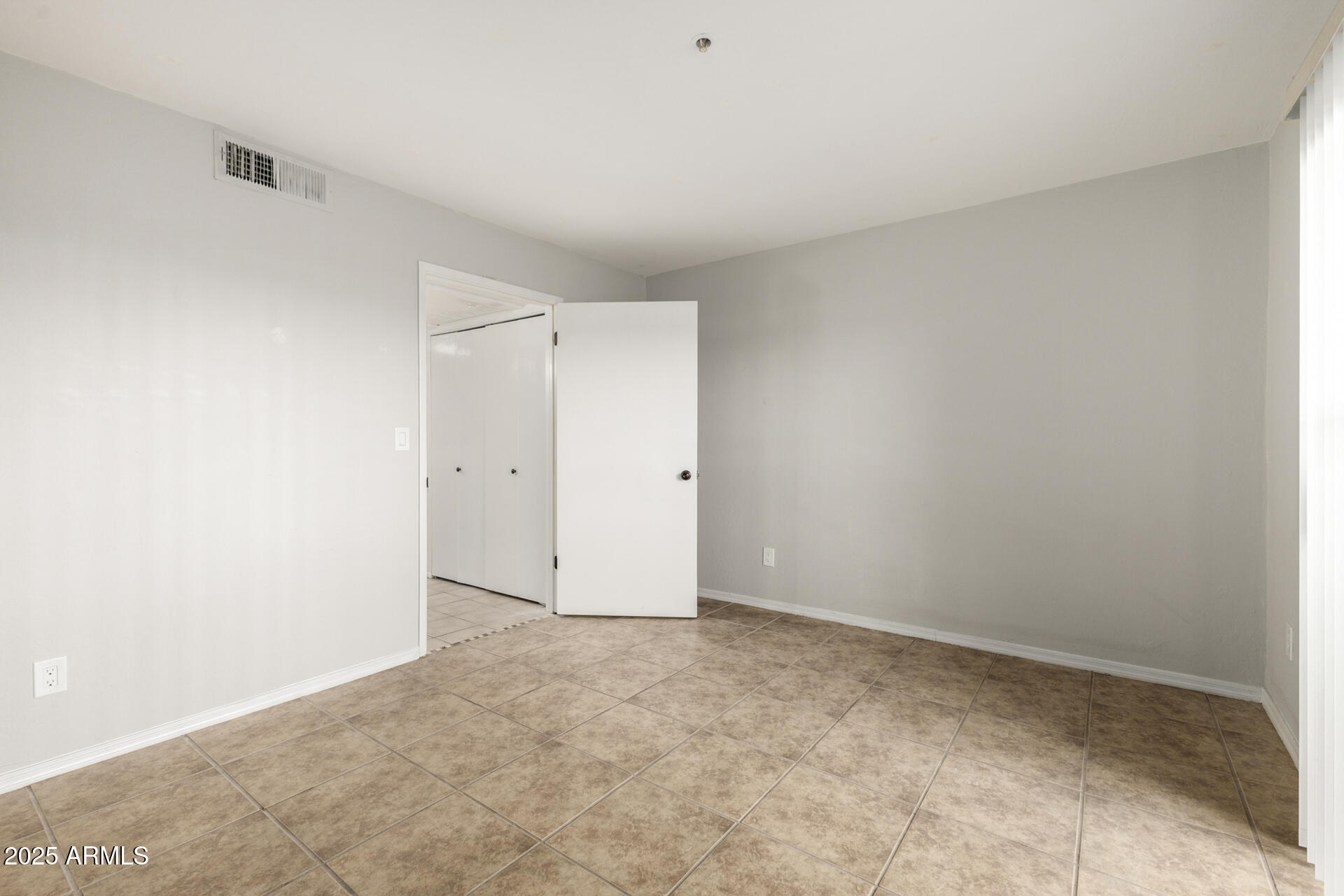 12123 West Bell Road, Unit 110 Surprise, AZ 85378 - Photo 14 of 27 a view of an empty room