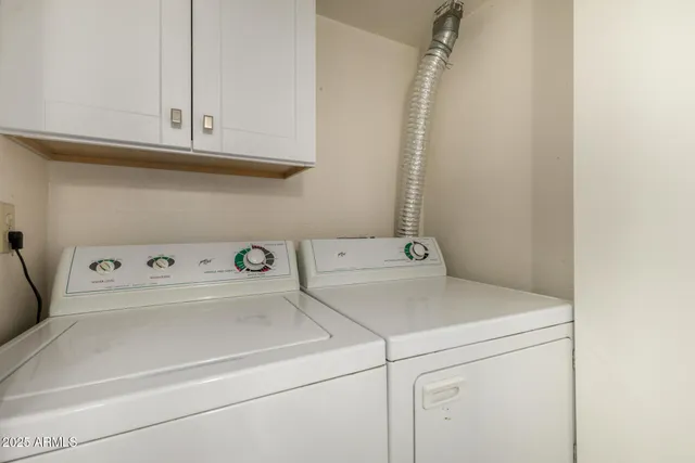 a bathroom with a glass door shower