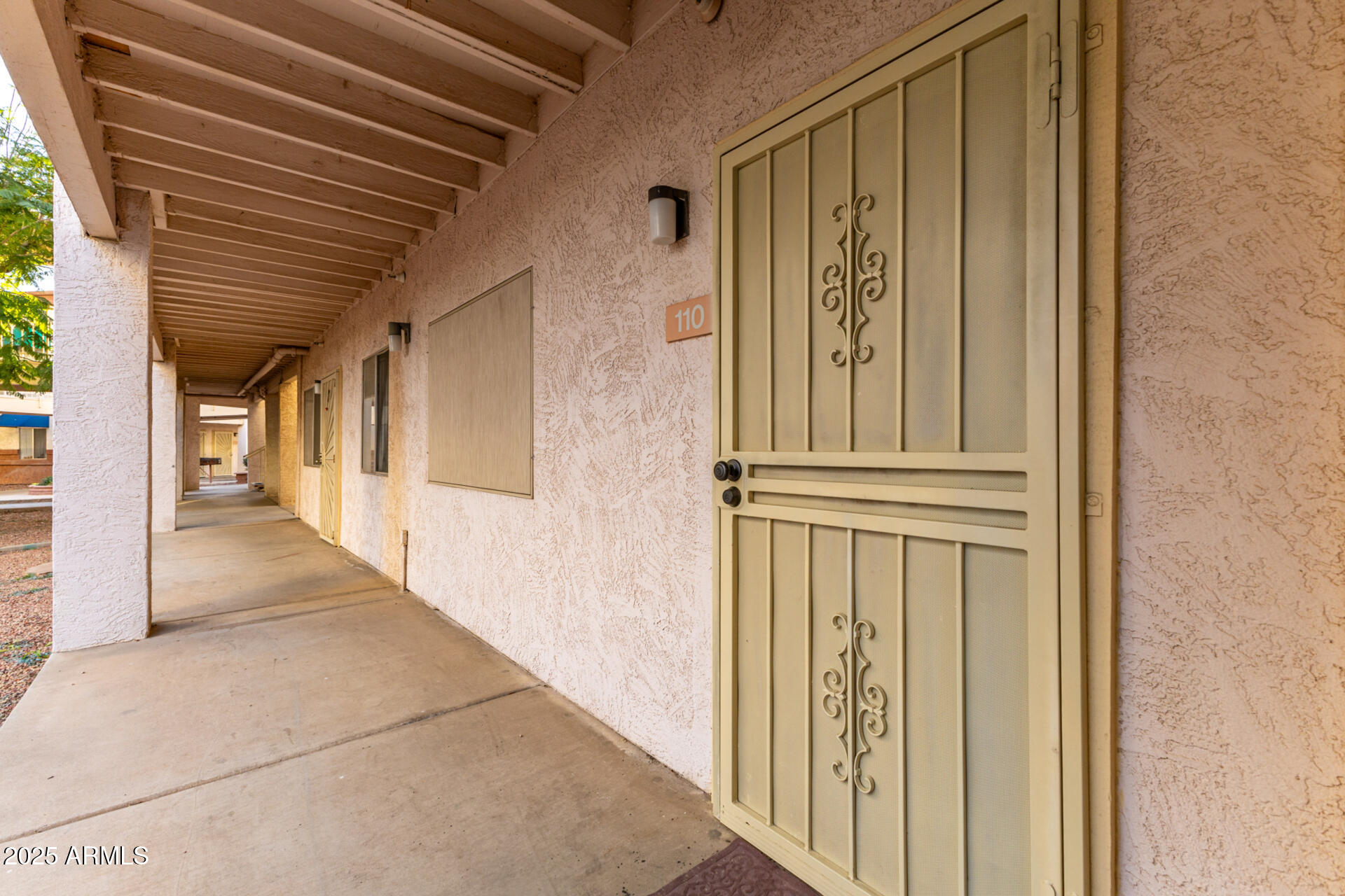 12123 West Bell Road, Unit 110 Surprise, AZ 85378 - Photo 2 of 27 a view of a entryway door of the house