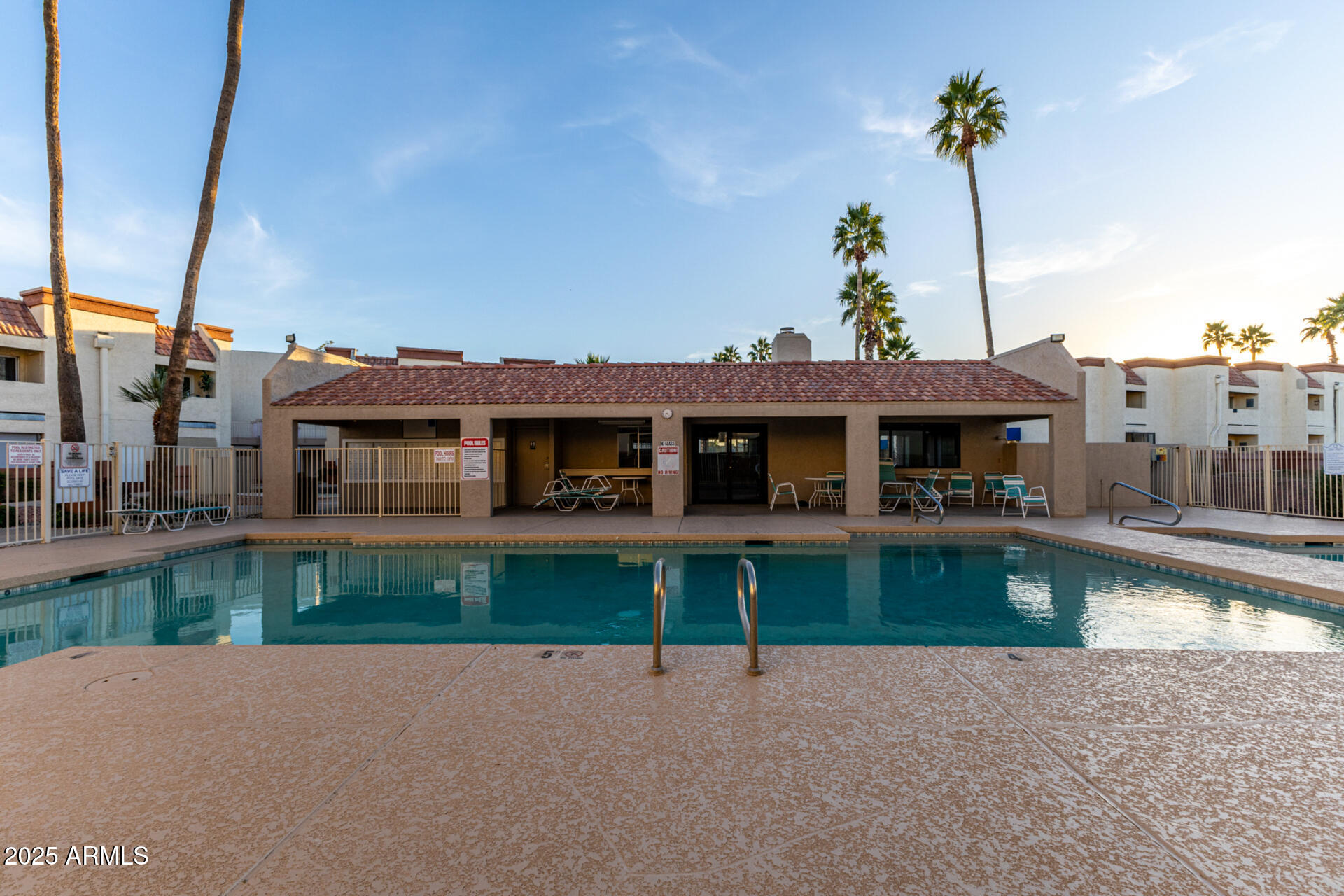 12123 West Bell Road, Unit 110 Surprise, AZ 85378 - Photo 22 of 27 a view of a house with a fountain