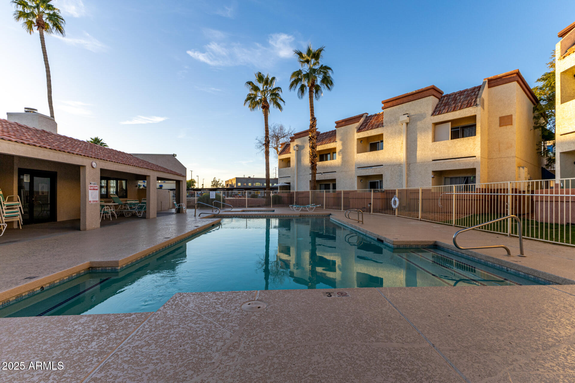 12123 West Bell Road, Unit 110 Surprise, AZ 85378 - Photo 23 of 27 a view of a house with a patio