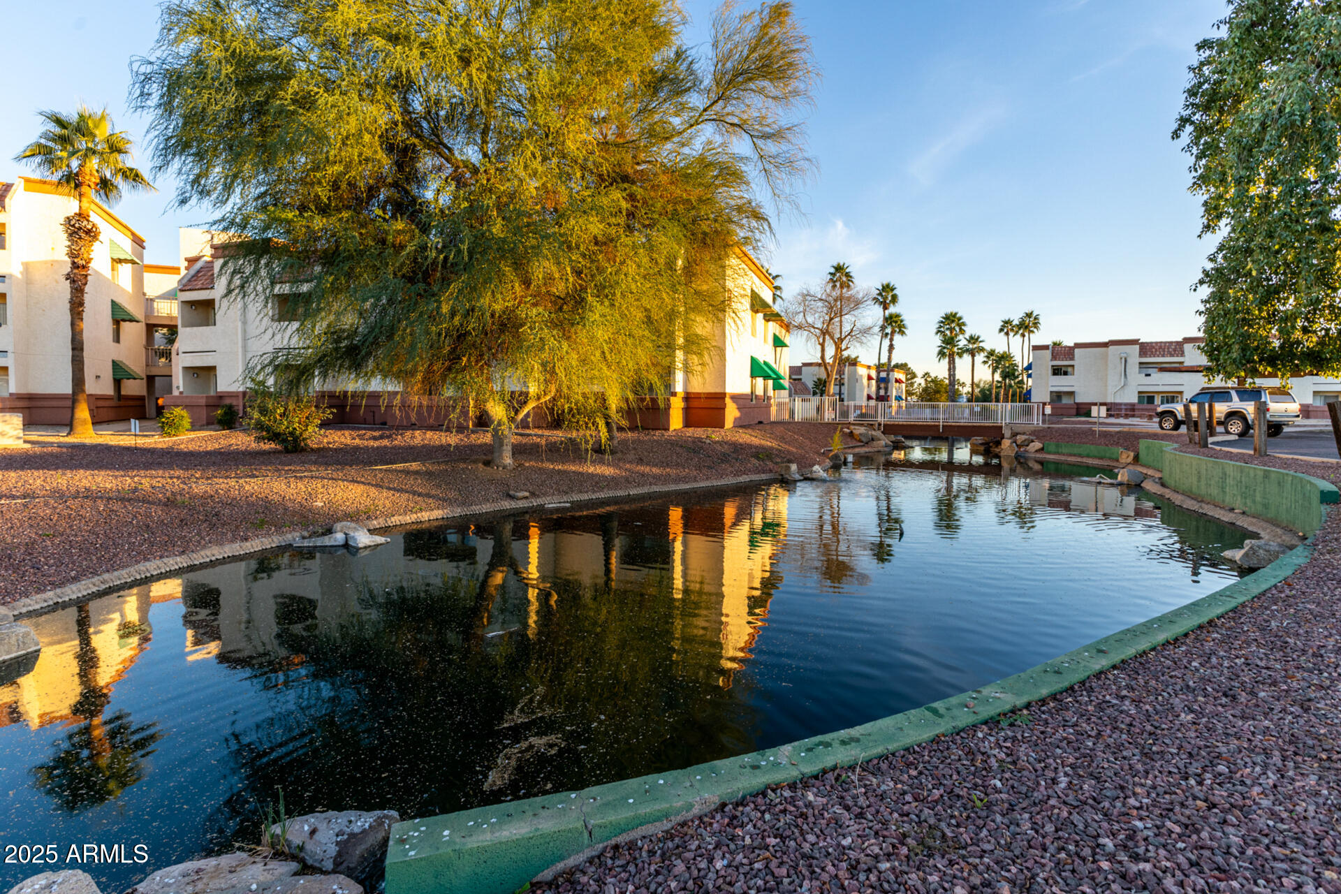 12123 West Bell Road, Unit 110 Surprise, AZ 85378 - Photo 26 of 27 a view of a swimming pool with sitting area