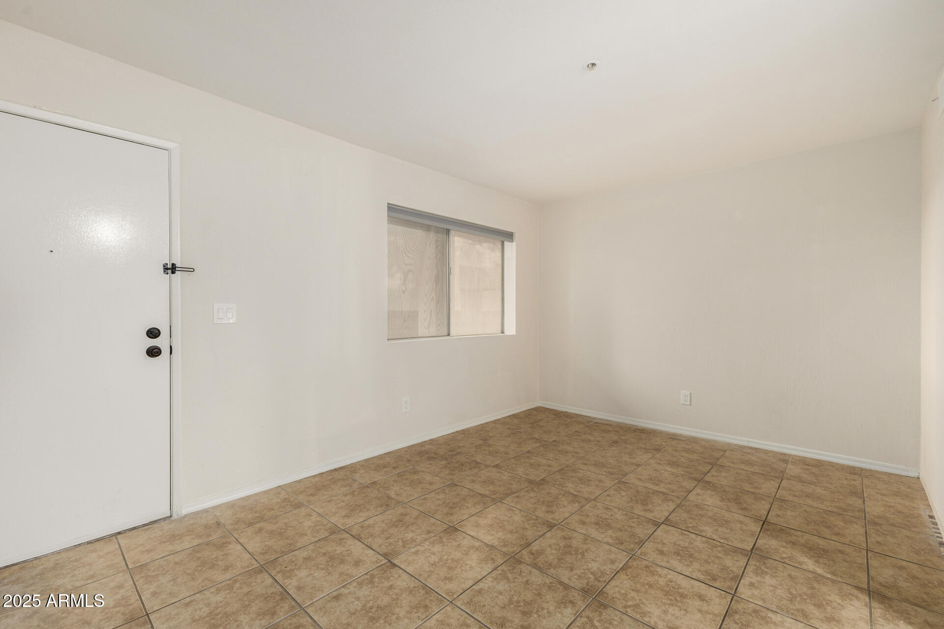 12123 West Bell Road, Unit 110 Surprise, AZ 85378 - Photo 5 of 27 a view of an empty room
