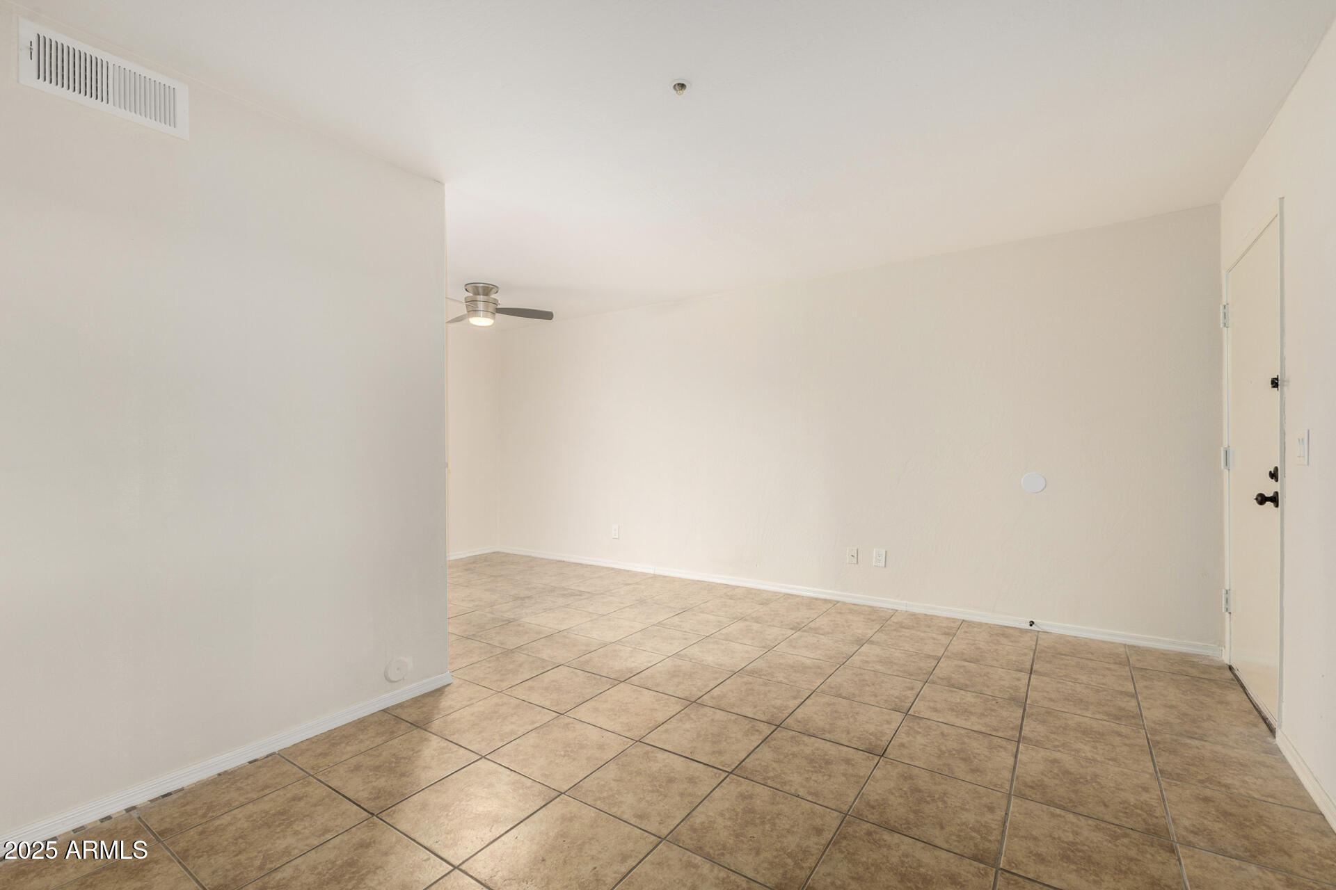 12123 West Bell Road, Unit 110 Surprise, AZ 85378 - Photo 6 of 27 a view of an empty room