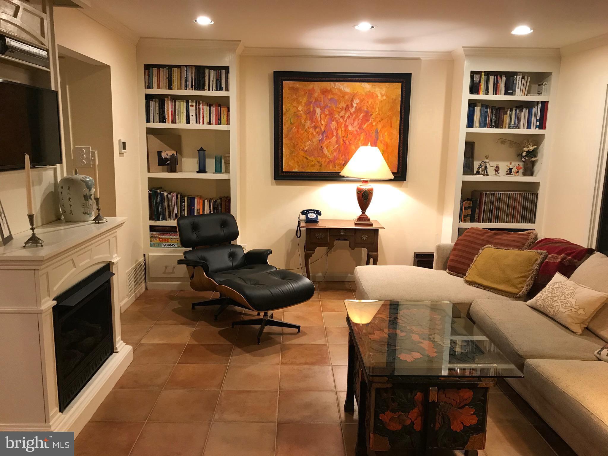 28 Eden Roc New Hope, PA 18938 - Photo 13 of 37 Custom built-ins, fireplace and recessed lighting