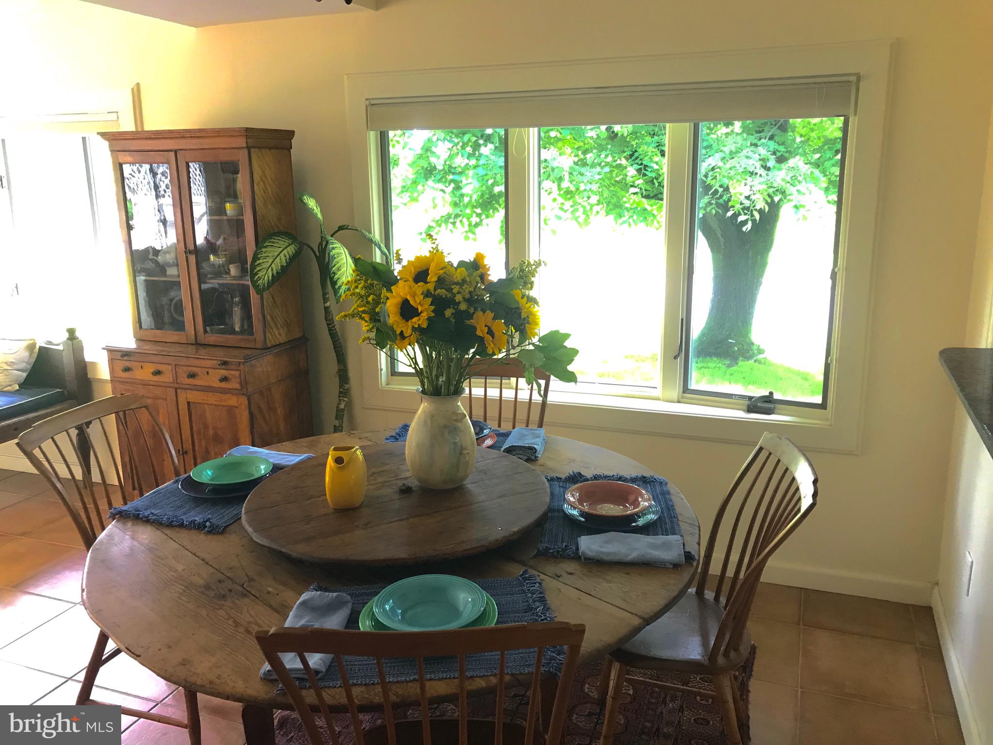 28 Eden Roc New Hope, PA 18938 - Photo 16 of 37 Bay window lights up the dining room