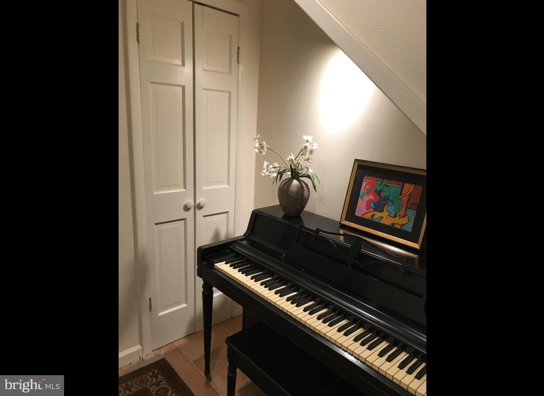 28 Eden Roc New Hope, PA 18938 - Photo 22 of 37 Sizable under-the-stairs nook with coat closet