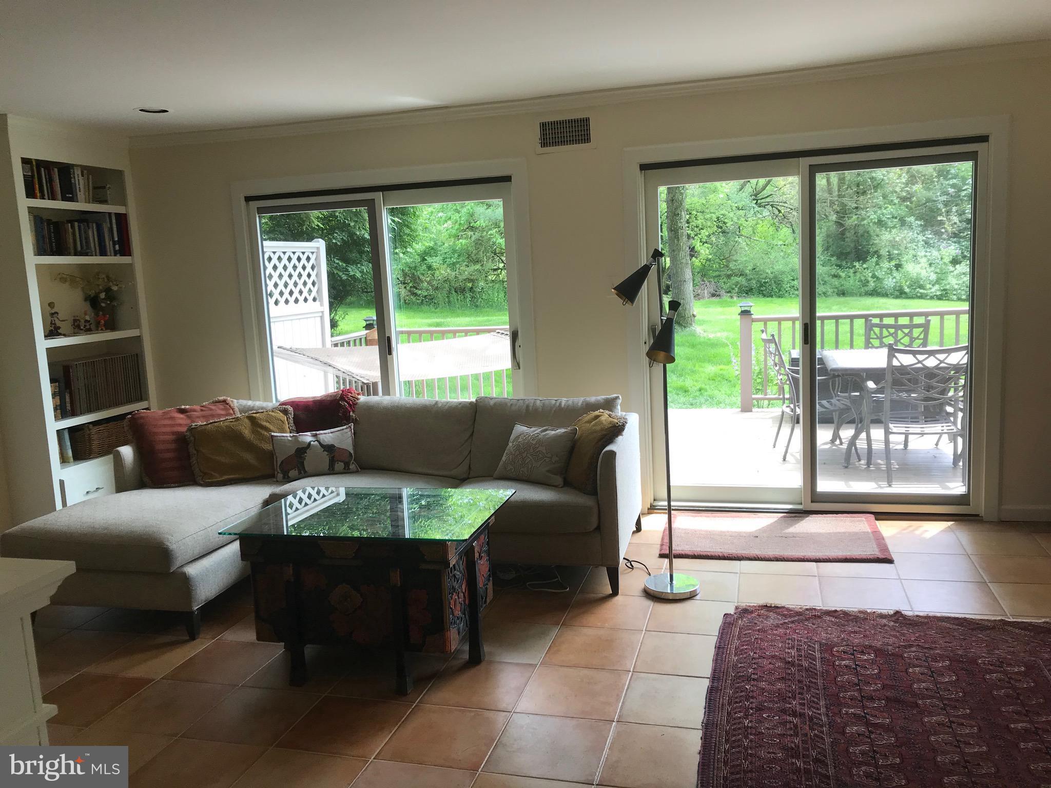28 Eden Roc New Hope, PA 18938 - Photo 10 of 37 Expansive living room across width of home