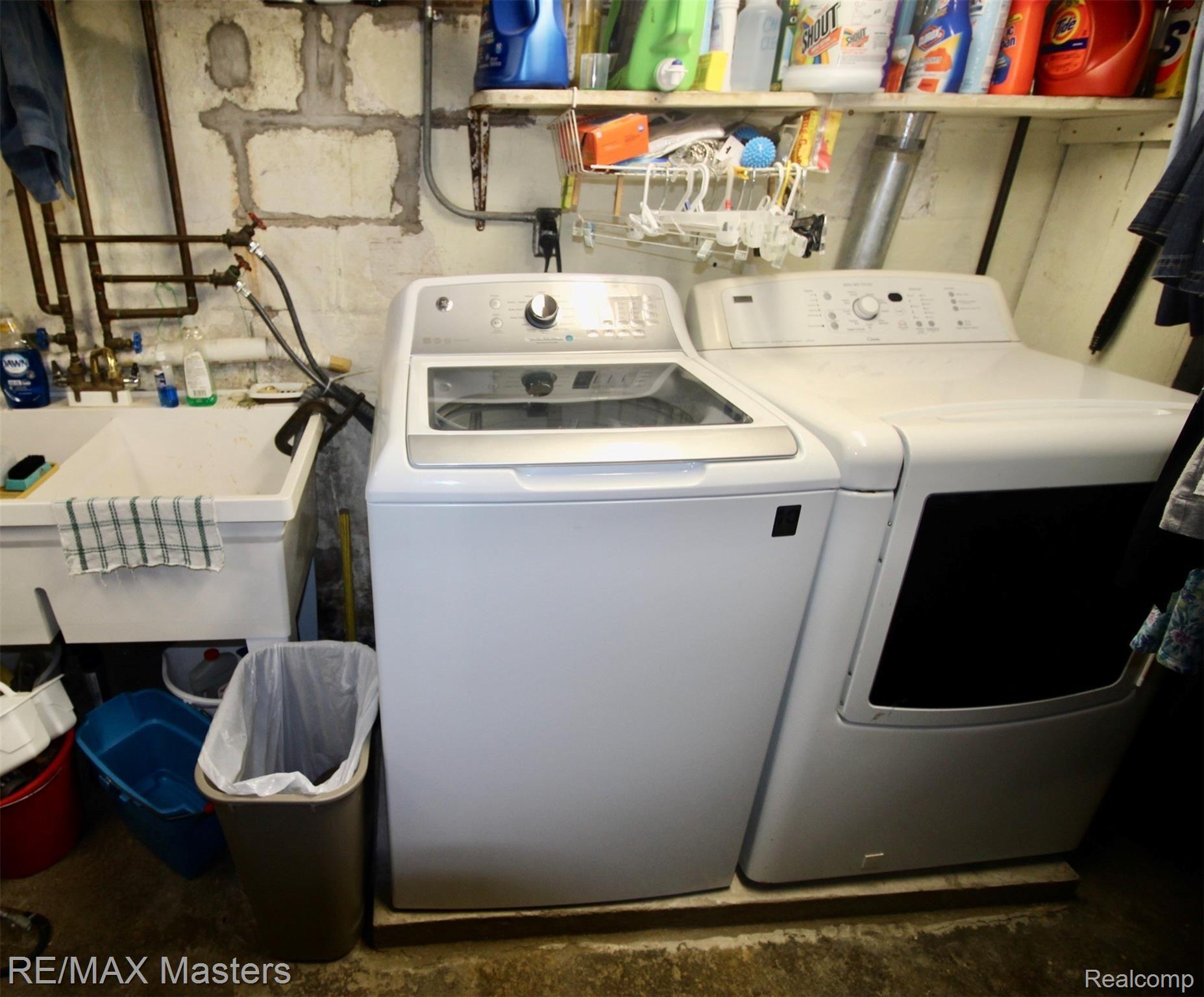 32430 King Road New Boston, MI 48164 - Photo 33 of 36 Basement features washer, dryer and laundry tub included in sale.