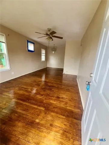 a view of water heater room with window