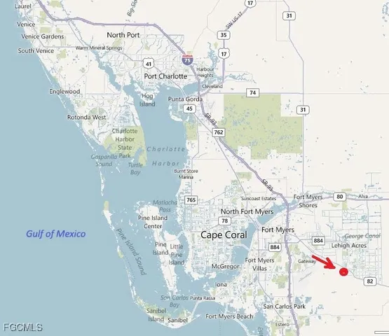 a water heater on a table next to a blue wall