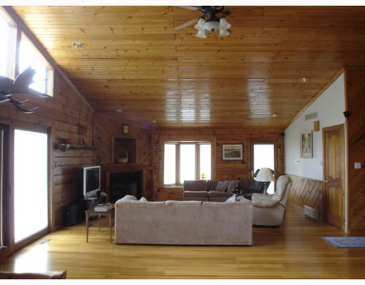 3901 Riverview Road North Huntingdon, PA 15642 - Photo 2 of 8 Living Room. Soaring tongue and groove knotty pine ceilings compliment the open floor plan of the main living area. The living room boasts a corner gas fireplace, geometric windows and access to the decks!