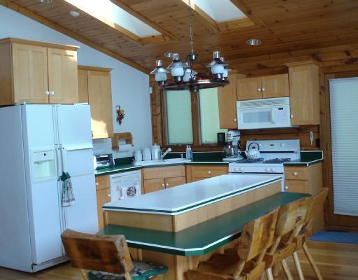 3901 Riverview Road North Huntingdon, PA 15642 - Photo 4 of 8 Kitchen. The fully equipped kitchen is skylit and has an oversized walk in pantry closet, desk area and corian topped island