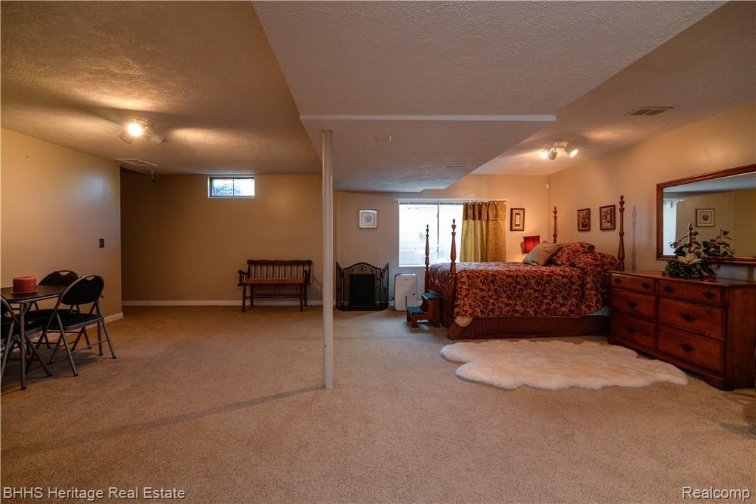 10100 Chase Lake Road Fowlerville, MI 48836 - Photo 32 of 41 Great Additional Gathering Space in LL