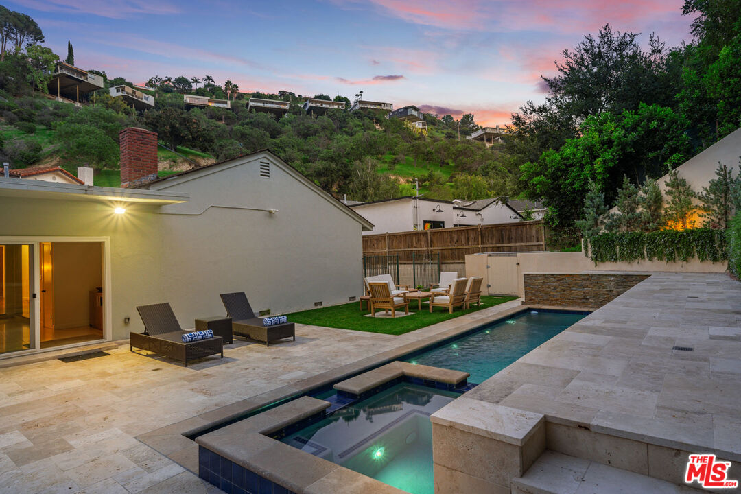 3771 Longview Valley Road Sherman Oaks, CA 91423 - Photo 16 of 75 a view of a house with backyard and sitting area