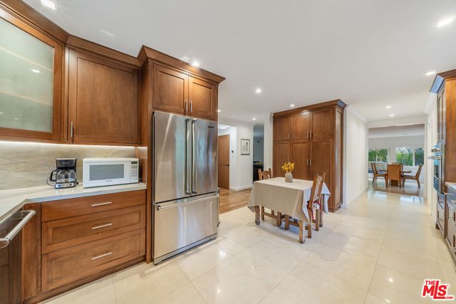 a view of a livingroom with furniture and wooden floor
