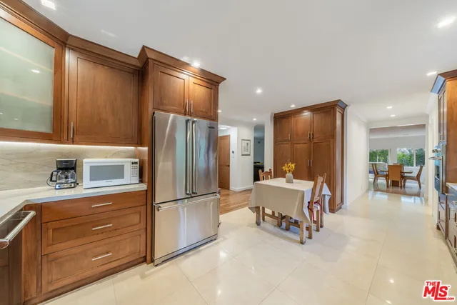 a view of a livingroom with furniture and wooden floor