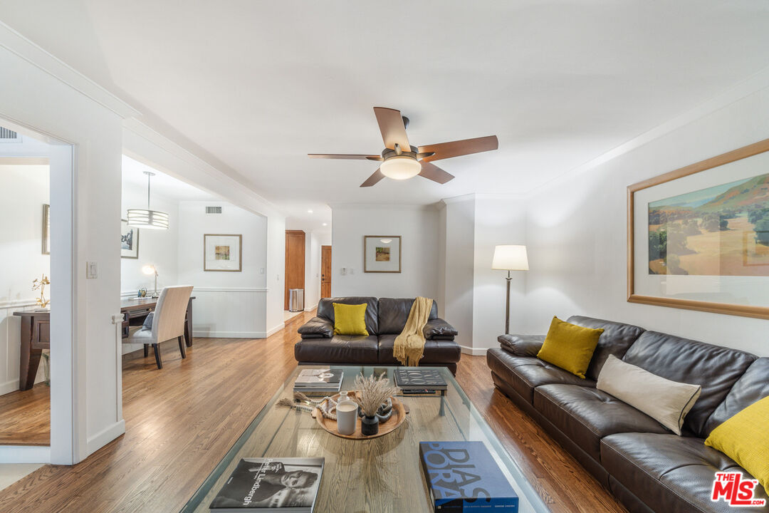 3771 Longview Valley Road Sherman Oaks, CA 91423 - Photo 61 of 75 a living room with furniture and wooden floor