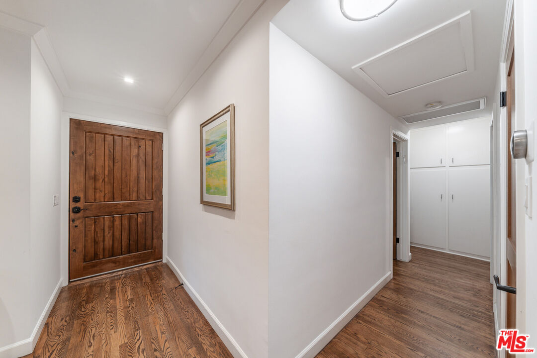 3771 Longview Valley Road Sherman Oaks, CA 91423 - Photo 63 of 75 a view of hallway with wooden floor