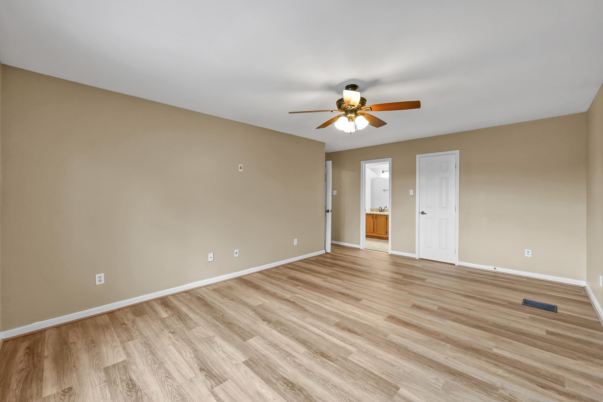16906 Timberwork Road Spring, TX 77379 - Photo 21 of 36 a view of an empty room with window and wooden floor