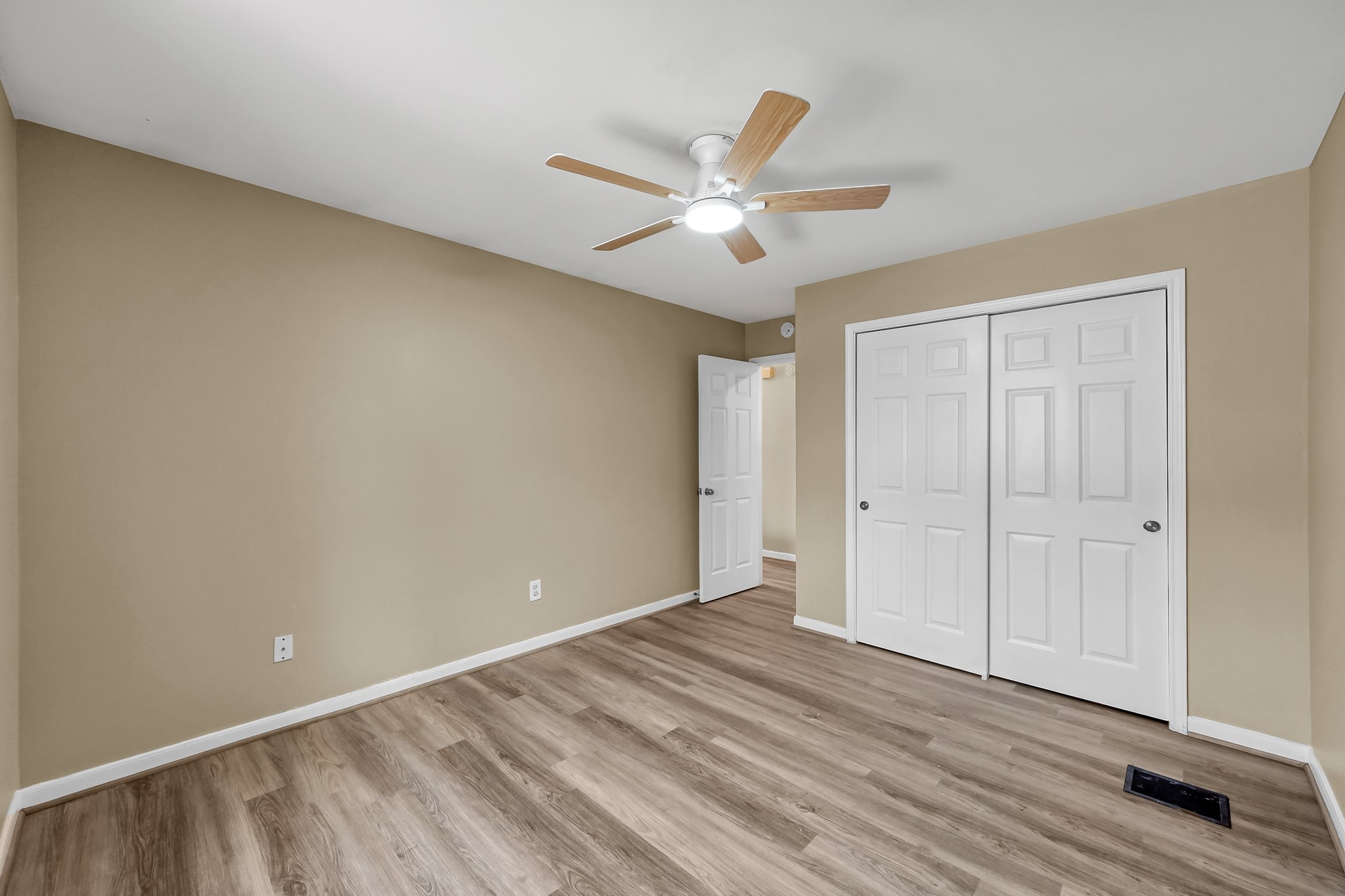 16906 Timberwork Road Spring, TX 77379 - Photo 25 of 36 a view of an empty room and wooden floor
