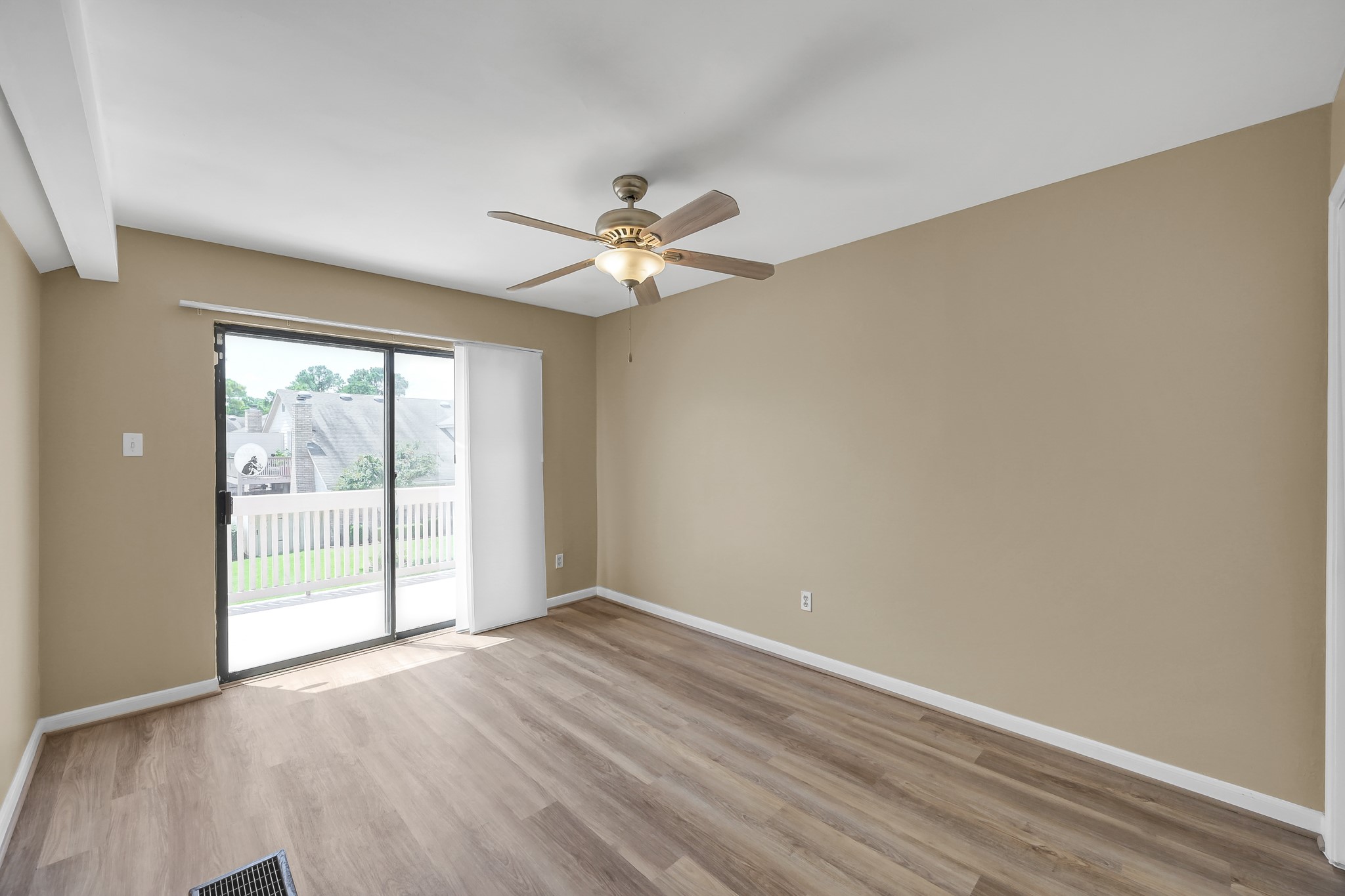 16906 Timberwork Road Spring, TX 77379 - Photo 27 of 36 wooden floor in an empty room with a window