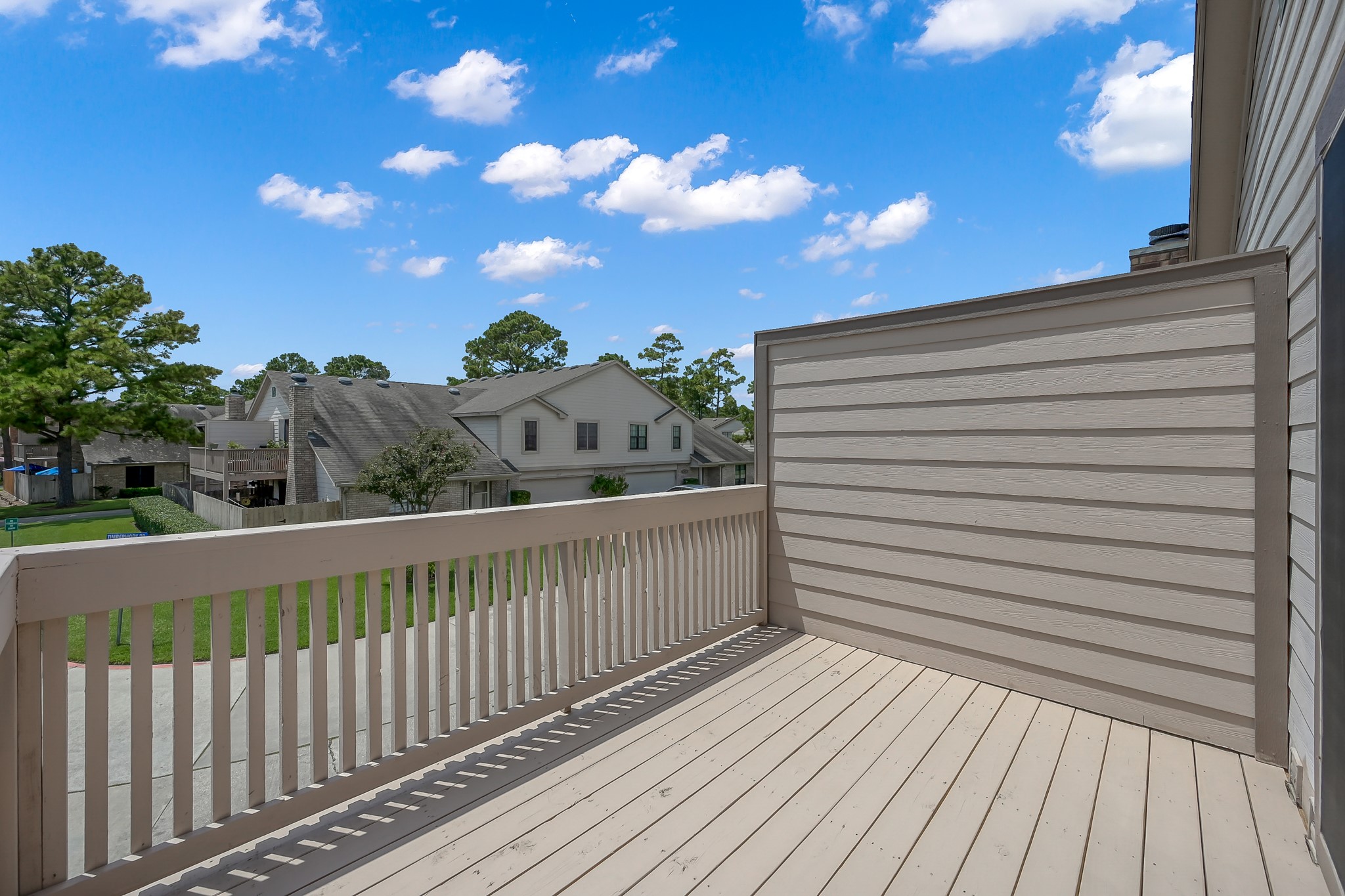 16906 Timberwork Road Spring, TX 77379 - Photo 29 of 36 a view of a balcony with wooden floor