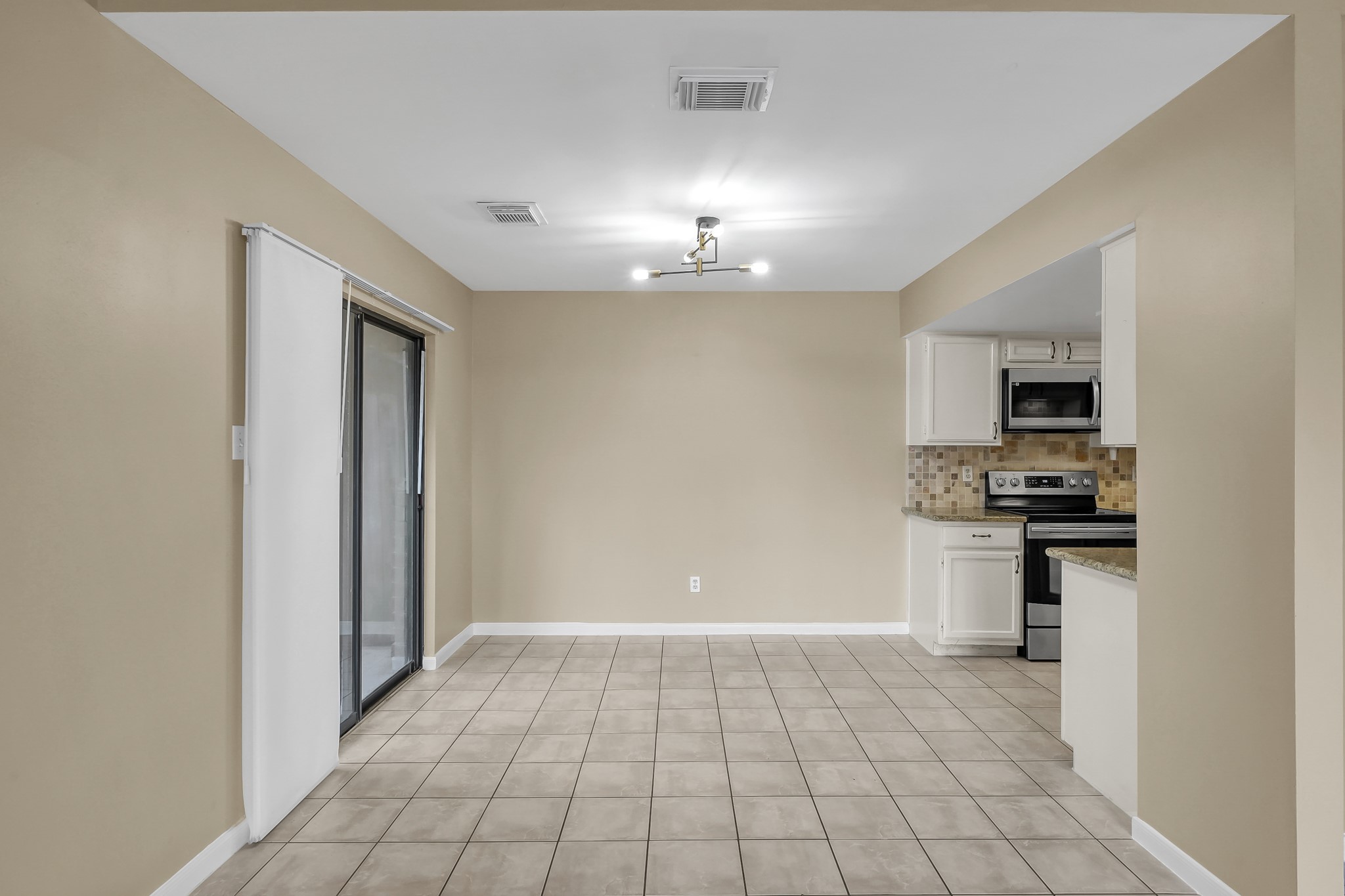 16906 Timberwork Road Spring, TX 77379 - Photo 10 of 36 a view of a electric appliances in a kitchen