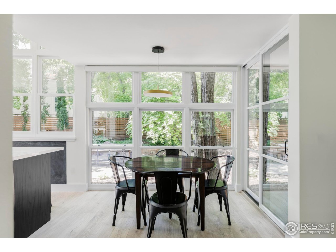 580 Pleasant Street Boulder, CO 80302 - Photo 3 of 29 a dining room with furniture window and outside view