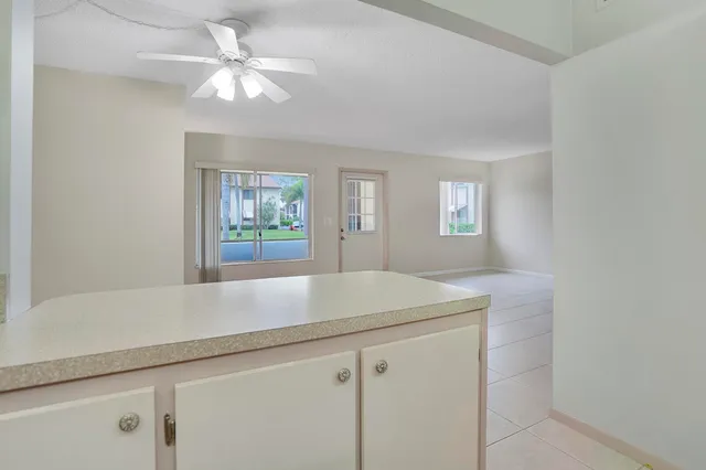 a view with cabinets and window