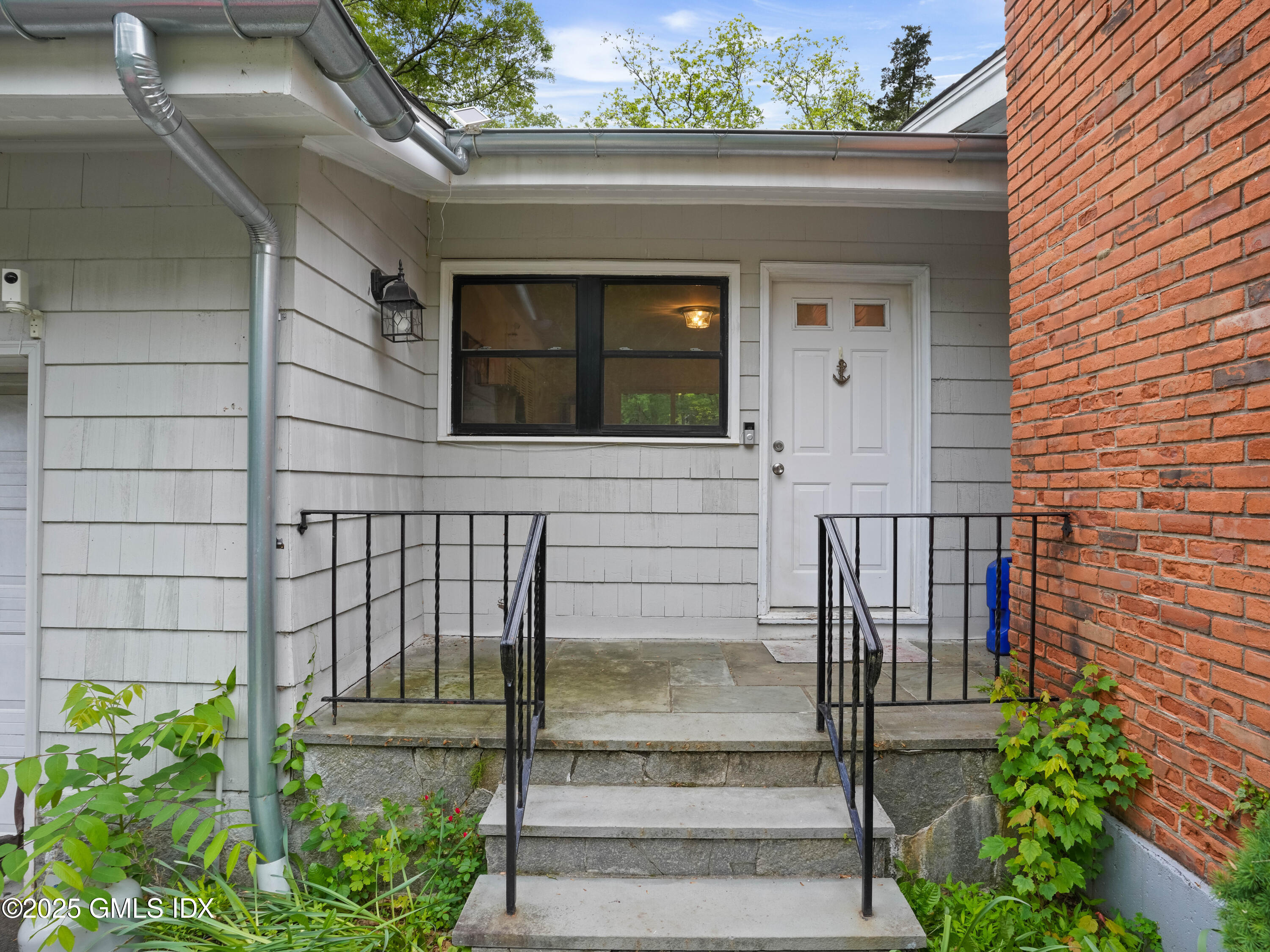 330 Cognewaugh Road Cos Cob, CT 06807 - Photo 19 of 24 Side Door