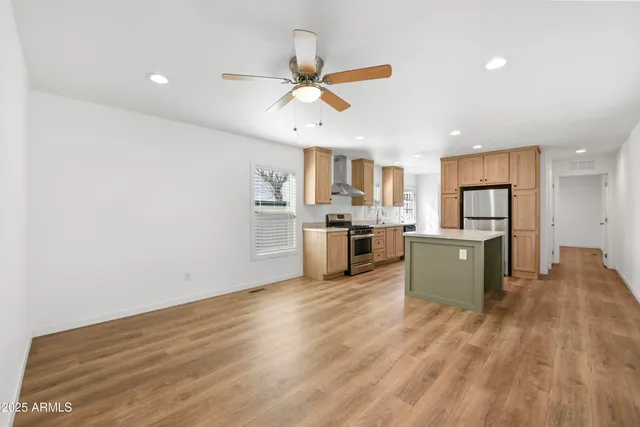 a view of kitchen with wooden floor