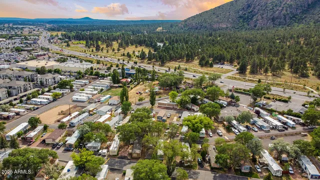 a view of a city with mountains in the background