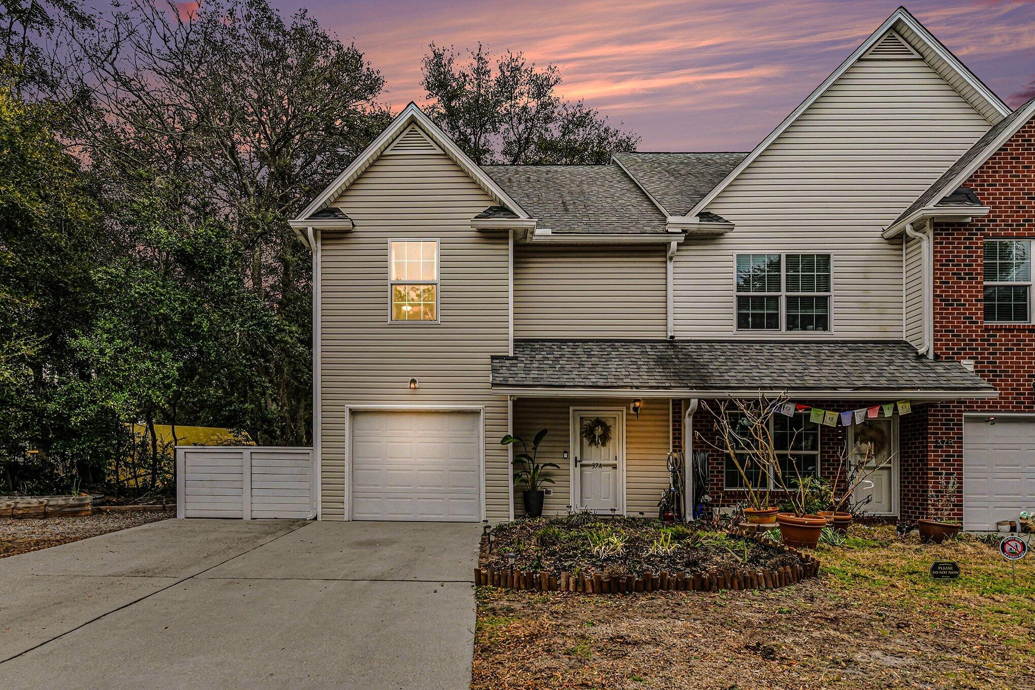 37 Rivers Point Row, Unit A Charleston, SC 29412 - Photo 1 of 29 Exterior at Twilight