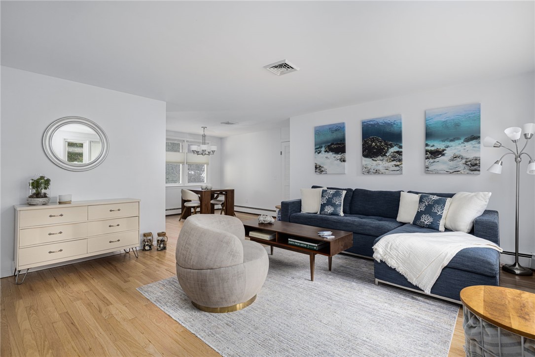 471 Annaquatucket Road North Kingstown, RI 02852 - Photo 17 of 50 This spacious living room is 18'5" x 15'2".