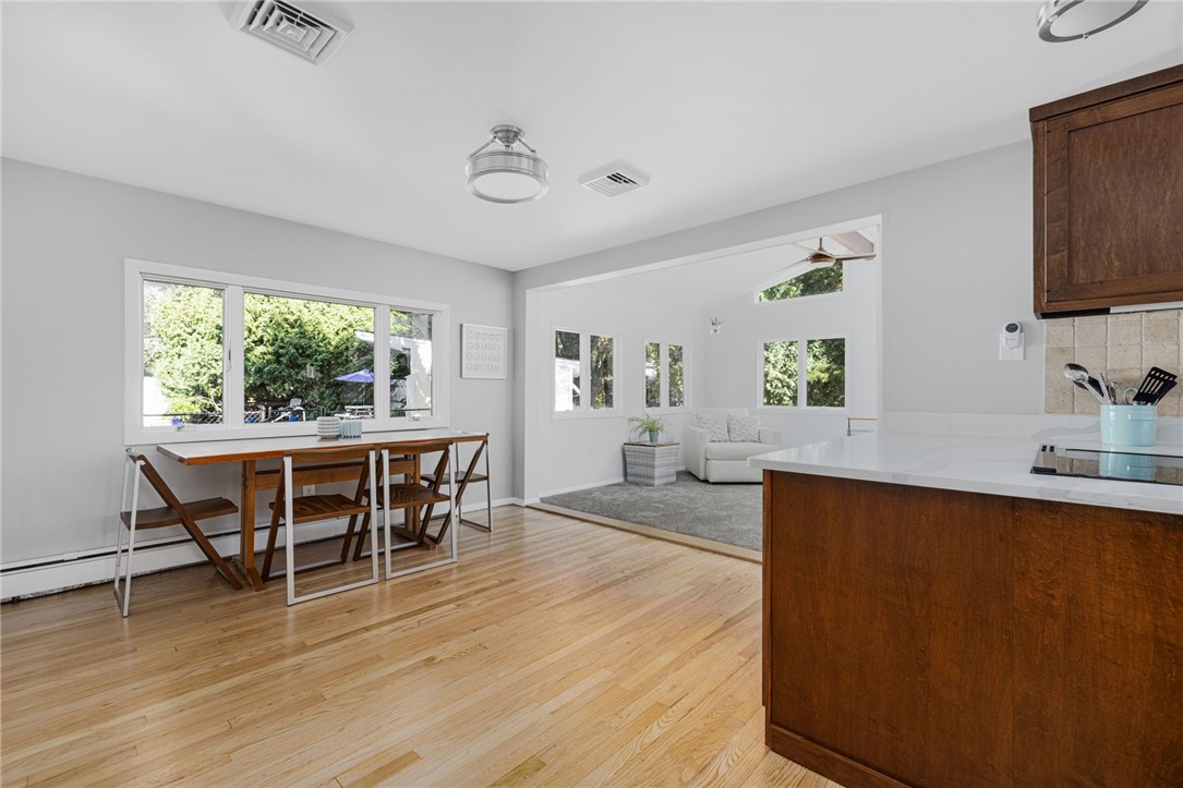 471 Annaquatucket Road North Kingstown, RI 02852 - Photo 26 of 50 The dining area opens to the family room.