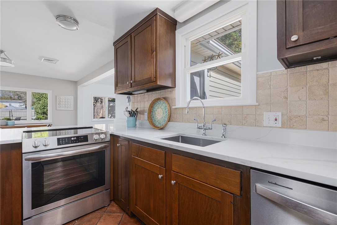 471 Annaquatucket Road North Kingstown, RI 02852 - Photo 32 of 50 Remodeled with 1960's original cabinetry! Beautiful stainless appliances too!