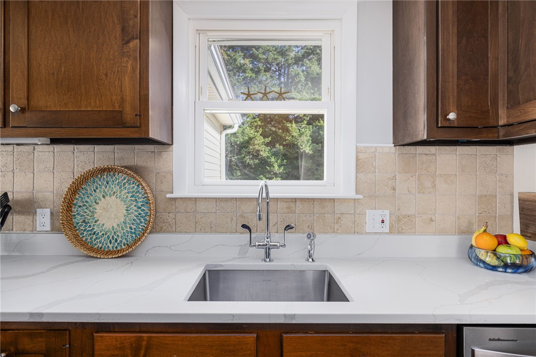 471 Annaquatucket Road North Kingstown, RI 02852 - Photo 33 of 50 Beautiful new quartz counters and re-purposed sink faucet.
