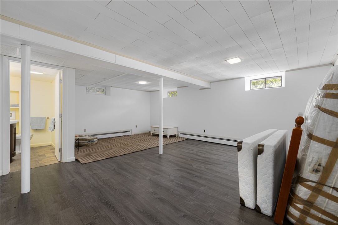 471 Annaquatucket Road North Kingstown, RI 02852 - Photo 45 of 50 This is the lower level, great recreation space or your choice! This space is 21'11" x 22'1". A half bath is to the left.