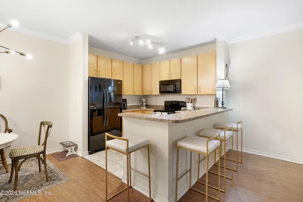 a view of a dining room with furniture