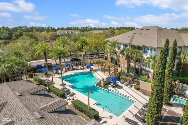 a view of a city with a building in the background