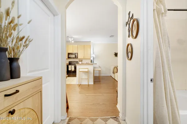 a view of a kitchen with furniture and a fireplace