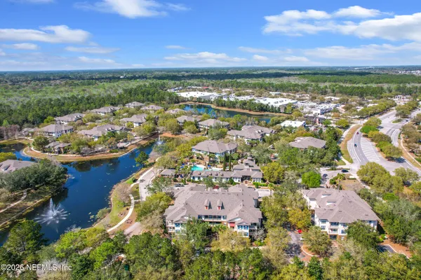 a view of a street with trees in the background