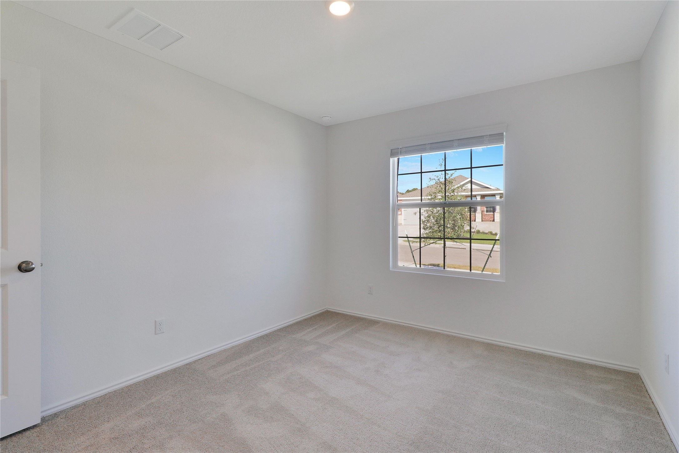 2524 Four Waters Loop Georgetown, TX 78628 - Photo 21 of 36 an empty room with a window