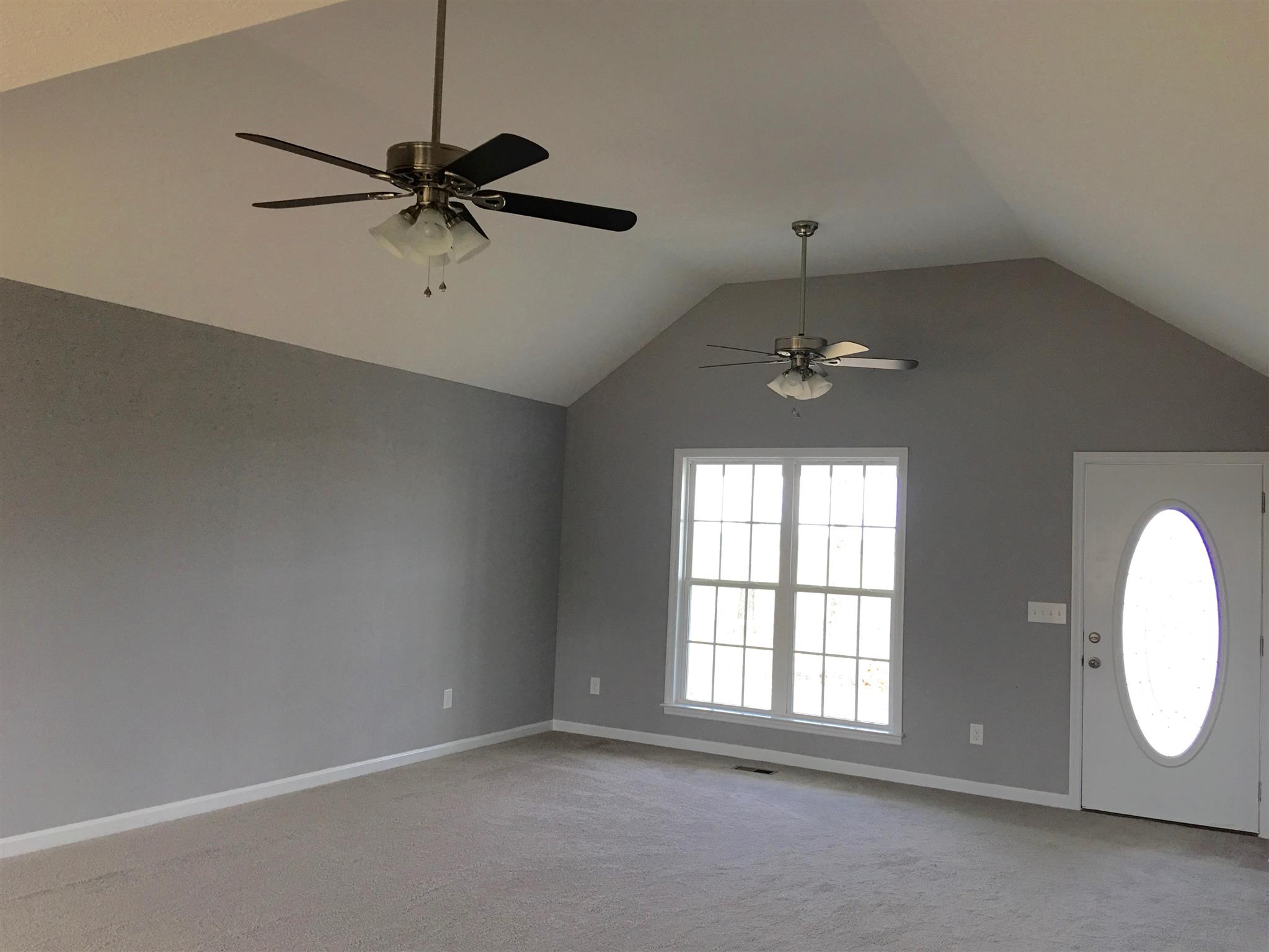 73 Benson School Road Kelso, TN 37348 - Photo 6 of 15 Living room area is open to kitchen/dining for lots of room.
