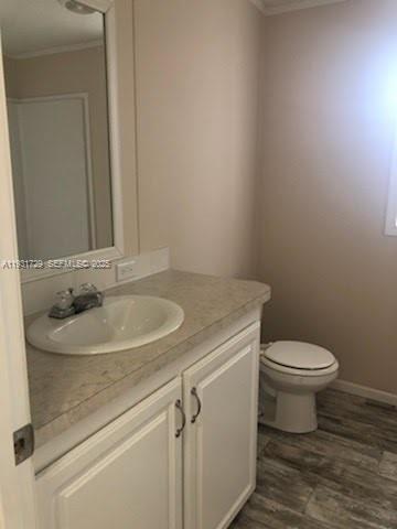 22884 Dolphin Road, Unit B Boca Raton, FL 33428 - Photo 4 of 14 a bathroom with a sink and a toilet