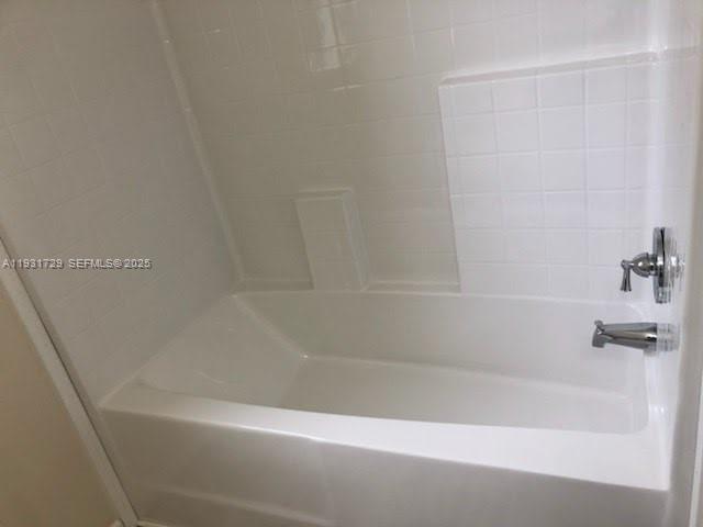 22884 Dolphin Road, Unit B Boca Raton, FL 33428 - Photo 5 of 14 a close up of a bathtub